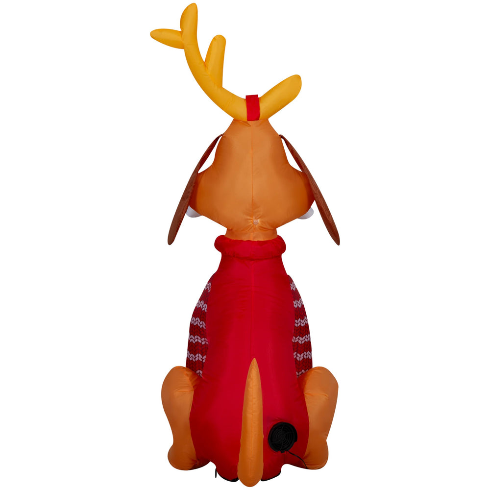 Gemmy Max inflated in yard at night with LED lights for eye-catching curb appeal