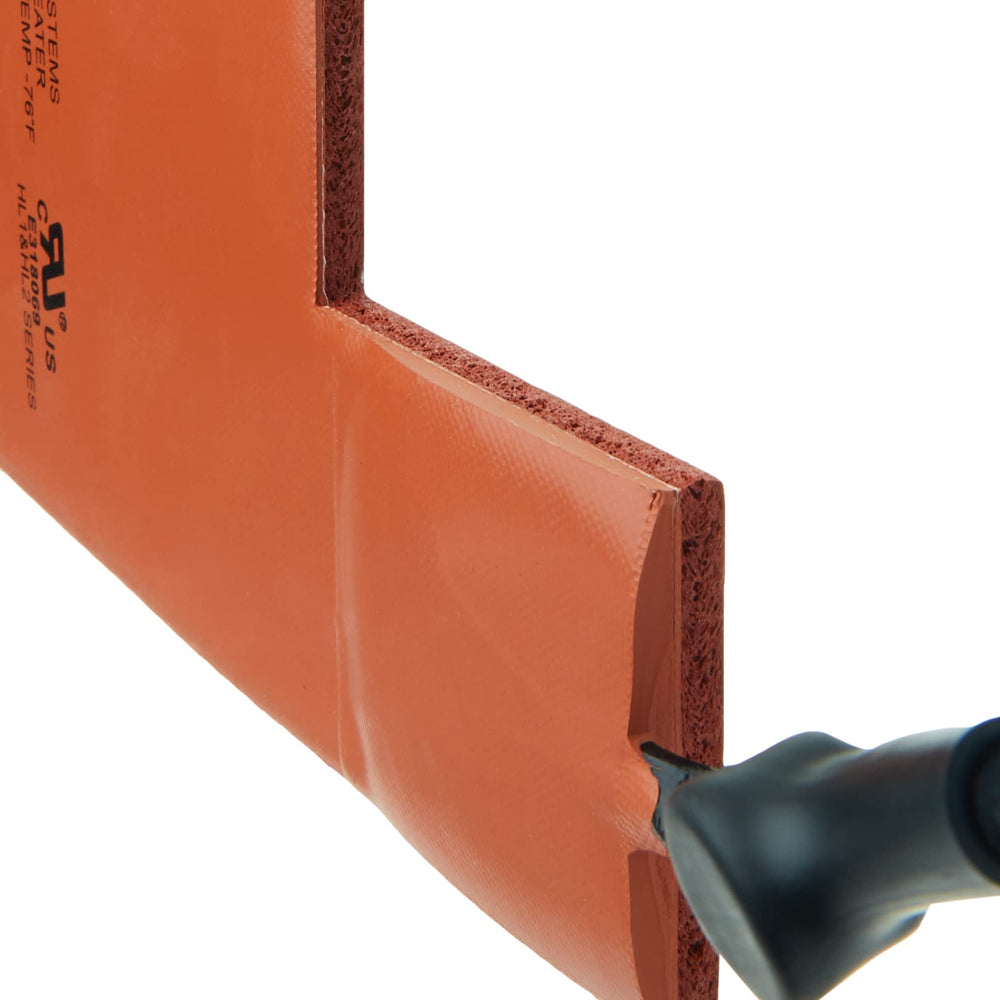 Generac heater pad next to ruler showing compact size and easy fit