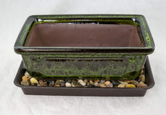 Generic close-up of moss green glaze texture highlighting ceramic finish
