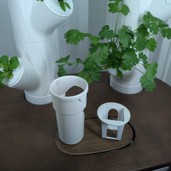 Generic grow cube inserted in Gardyn slot demonstrating secure fit and easy installation