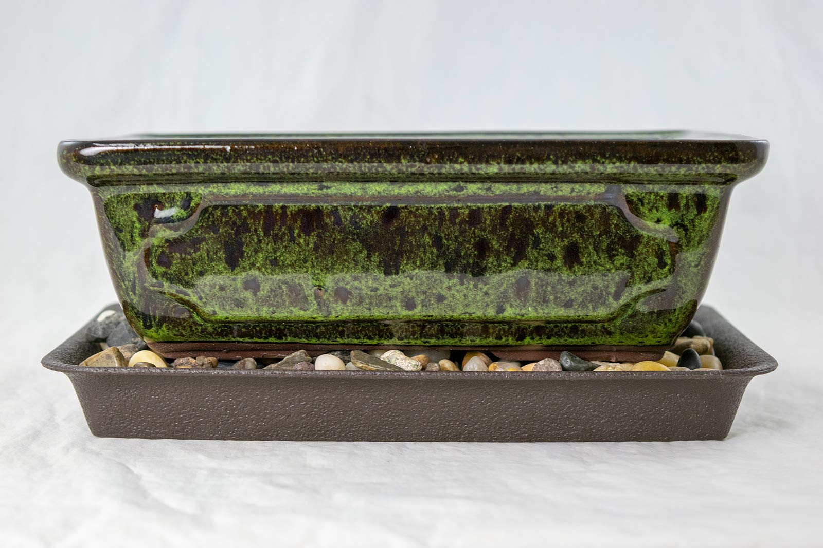 Generic moss green pot front view showing clean lines and glazed finish
