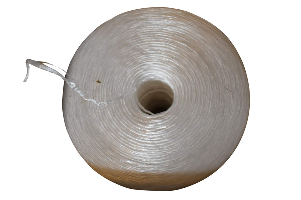 Generic NPS twine roll next to ruler showing scale and long 6,300ft length