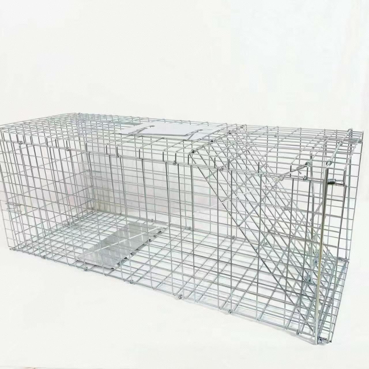 Generic trap held by hand for size comparison showing compact transport benefit