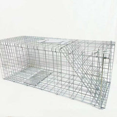 Generic trap held by hand for size comparison showing compact transport benefit