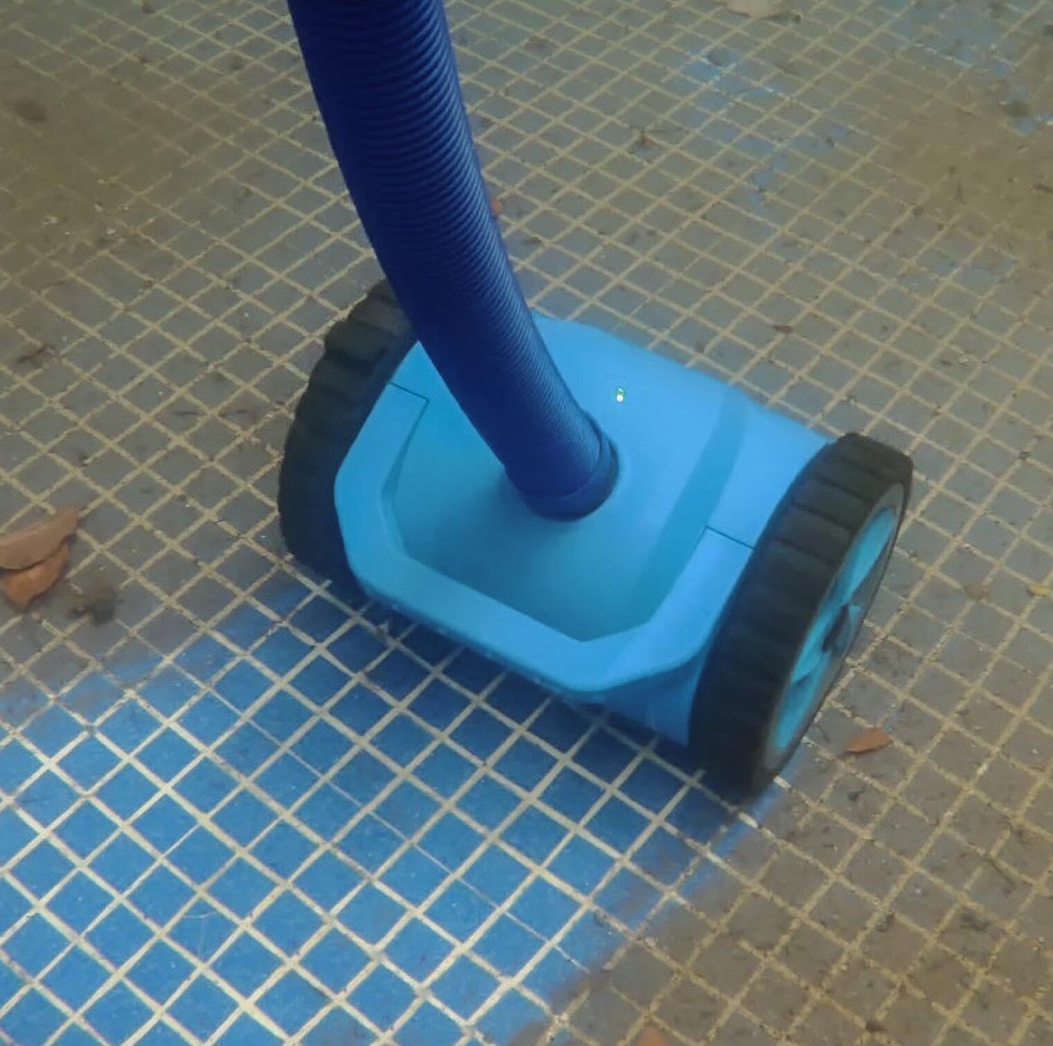 Generic unit next to a pool skimmer showing compact size and install benefit
