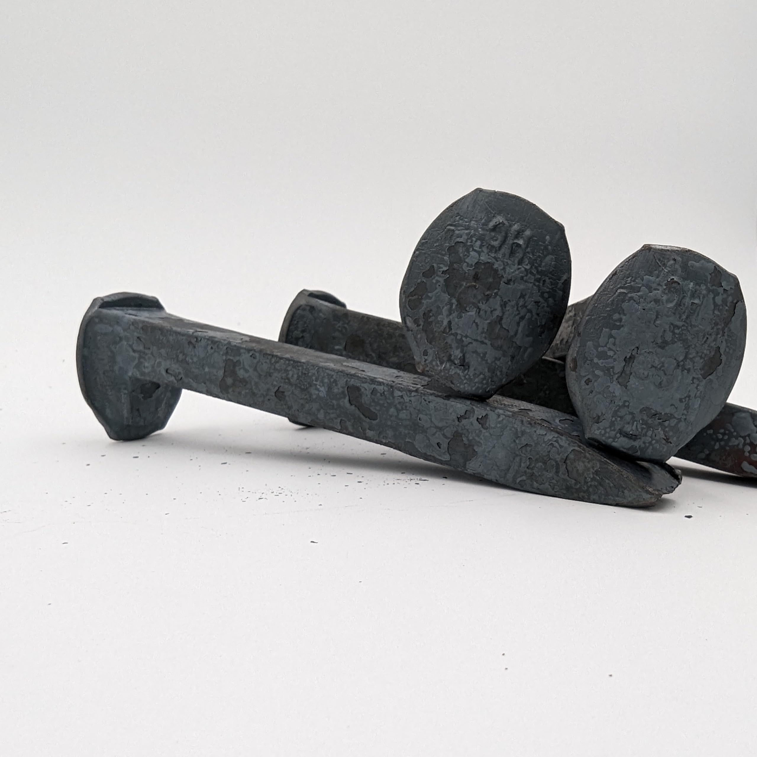 Generic brand spike next to ruler showing 6.5 inch length for scale and planning