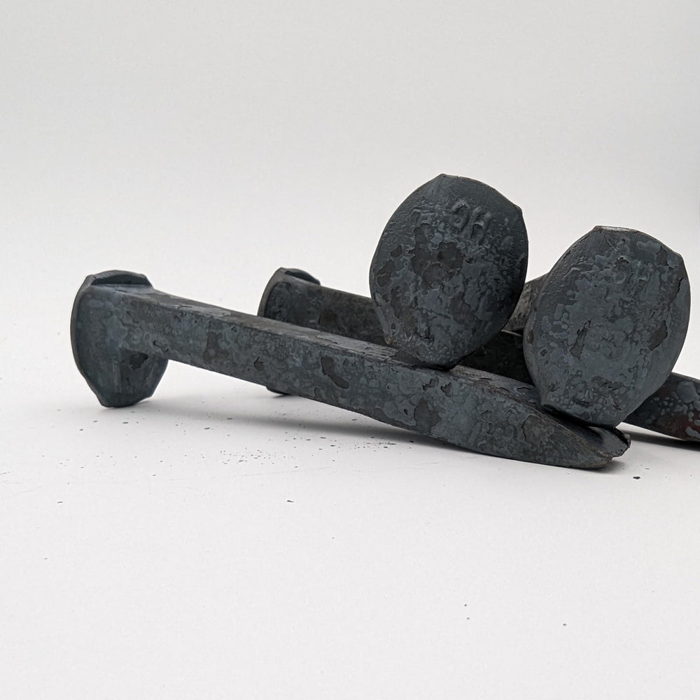 Generic brand spike next to ruler showing 6.5 inch length for scale and planning