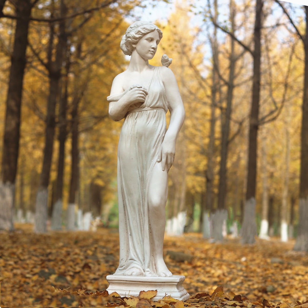 GENUINQ front view of nymph statue showing elegant pose and garden charm