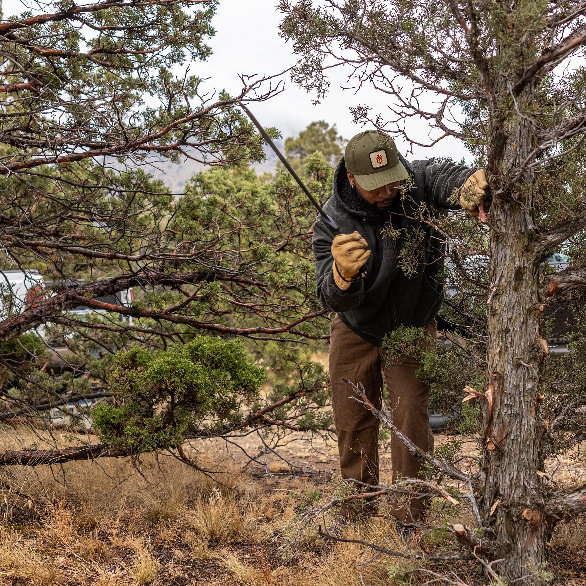 Gerber machete on campsite log showing versatile field use and reliability