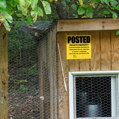 Geyee sign mounted on wooden fence showing durable placement benefit