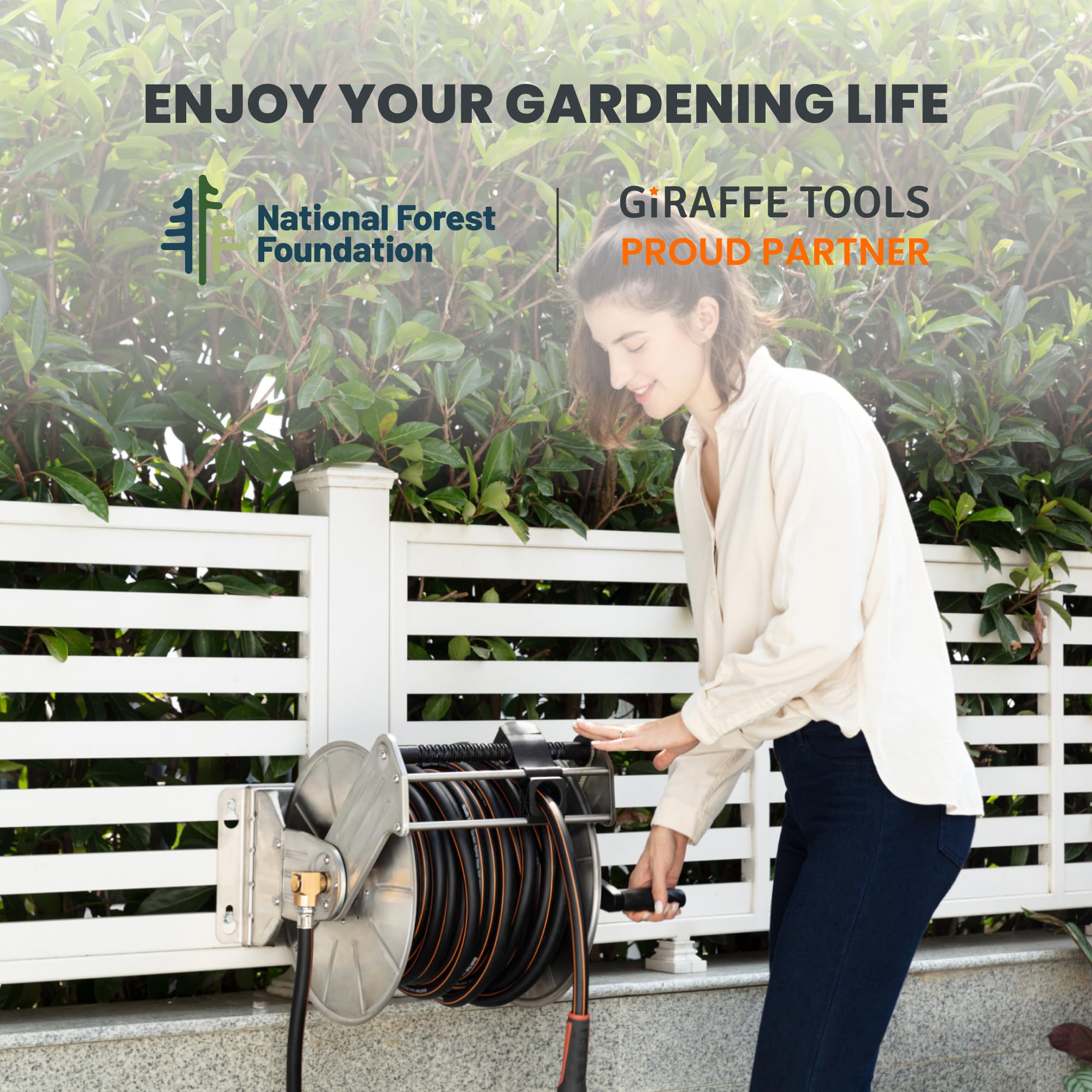 Giraffe Tools reel beside outdoor spigot showing scale and convenient access