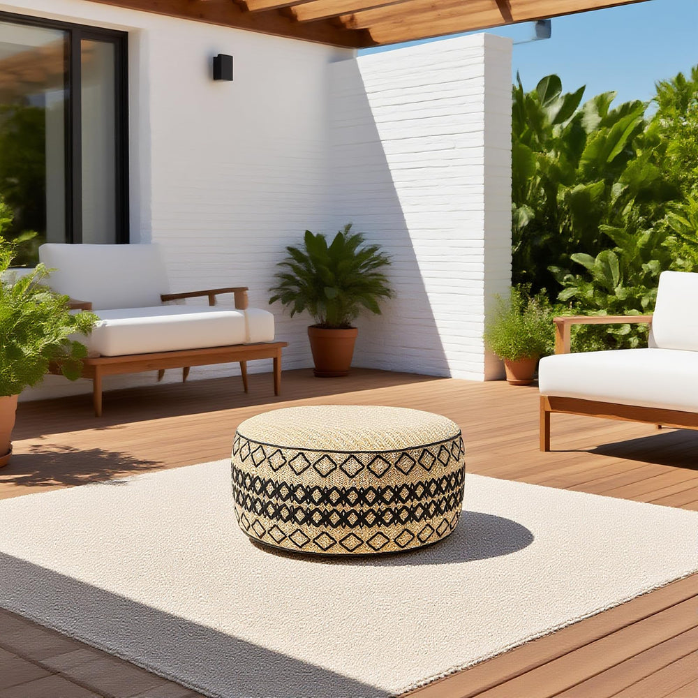 GLADTRAX ottoman used as footrest with tray showing multipurpose use