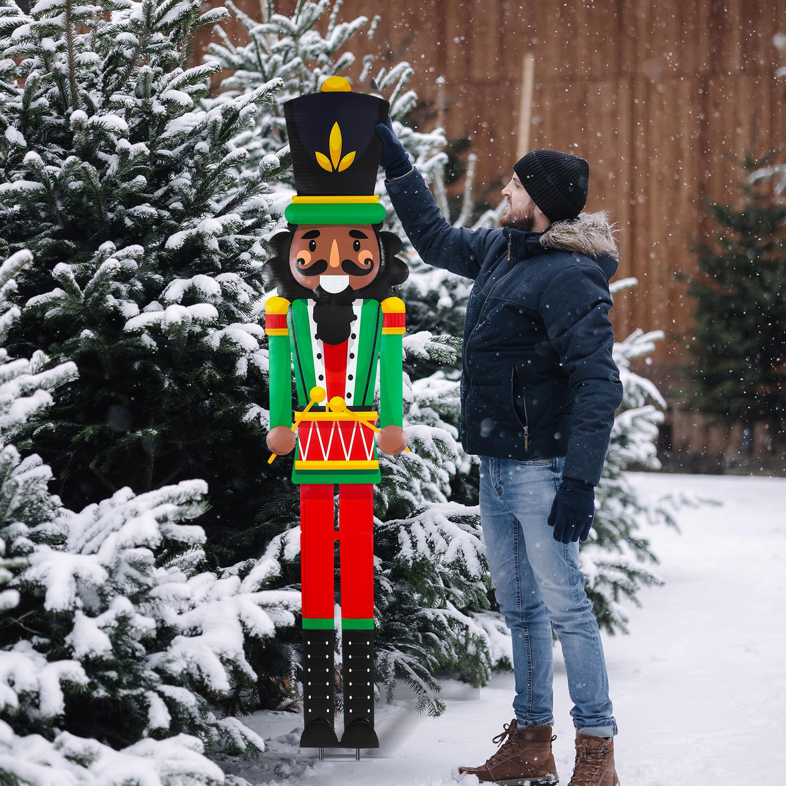 GlikCeil pair of nutcracker stakes flanking a porch adding welcoming holiday charm