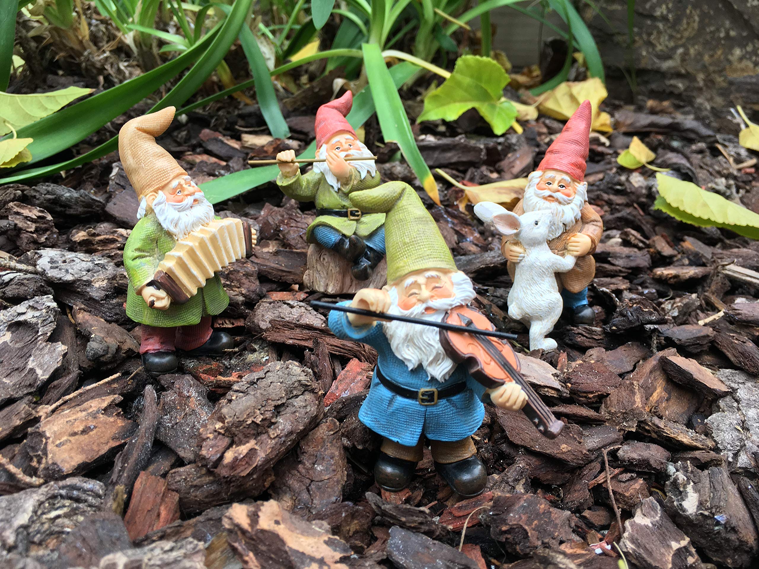 GlitZGlam dancing gnome with bunny detail conveying playful motion and character