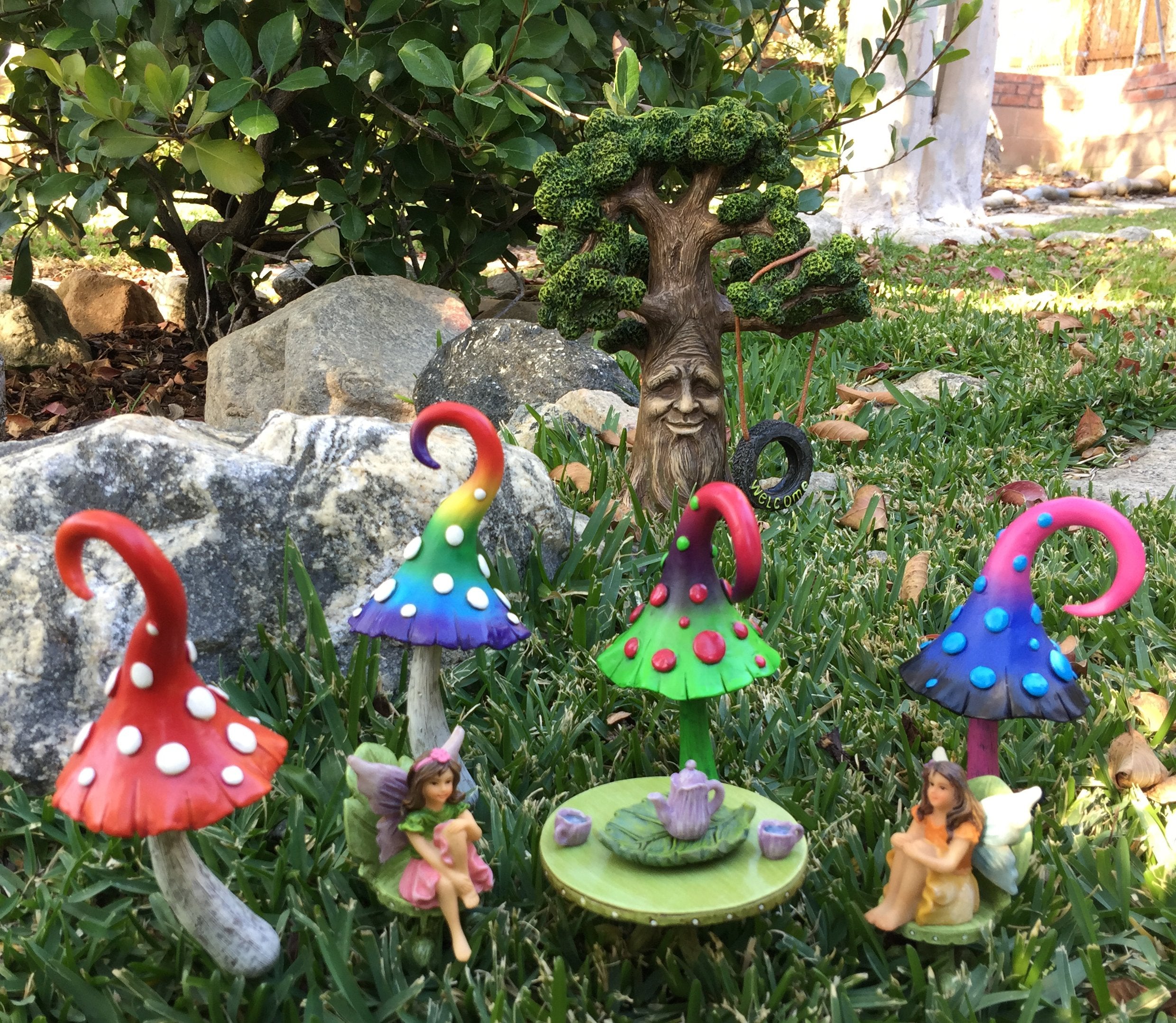 GlitZGlam tree staged in a fairy garden showing how it anchors miniature scenes