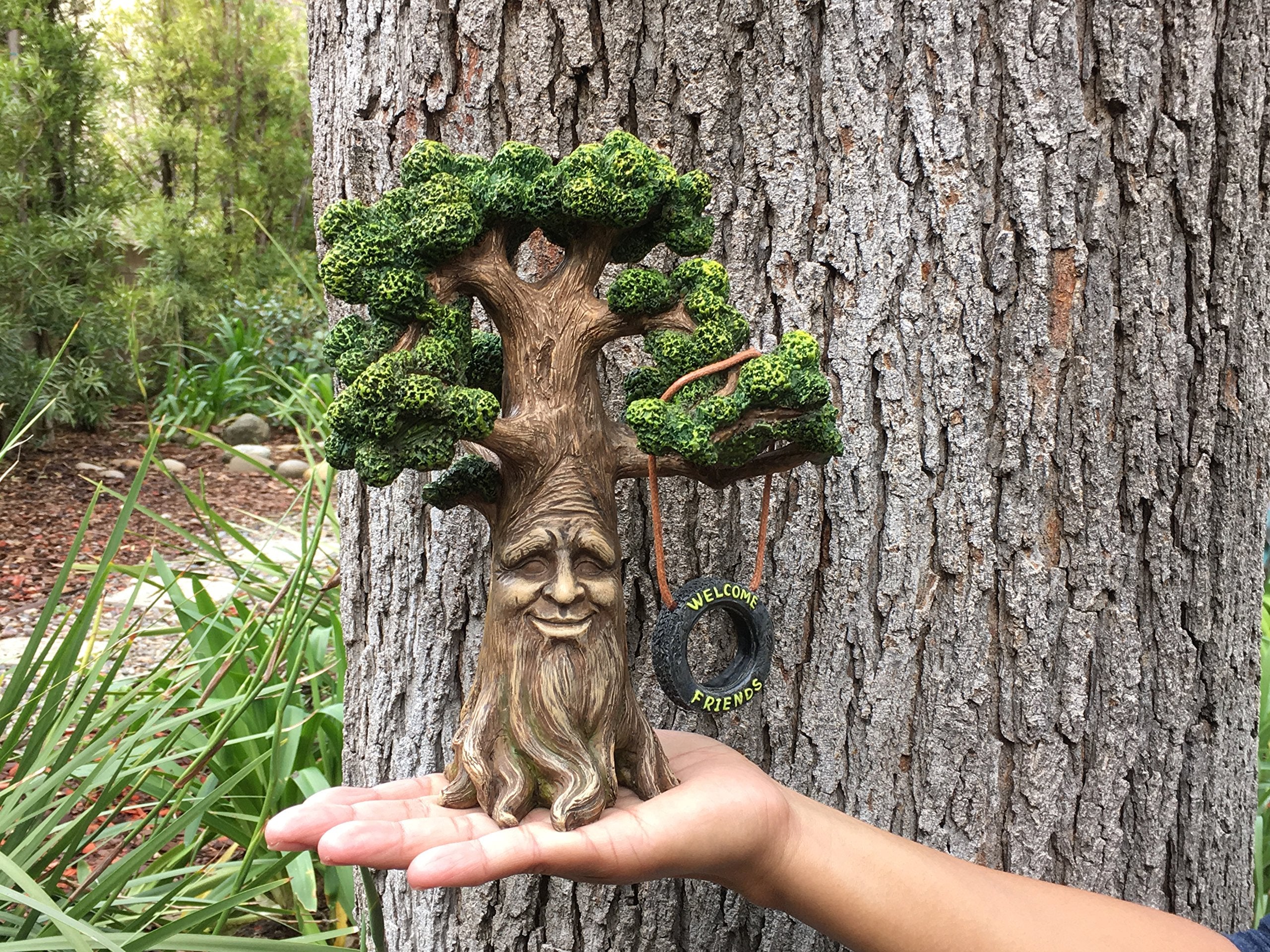 GlitZGlam tree shown next to a hand to display scale and effortless placement
