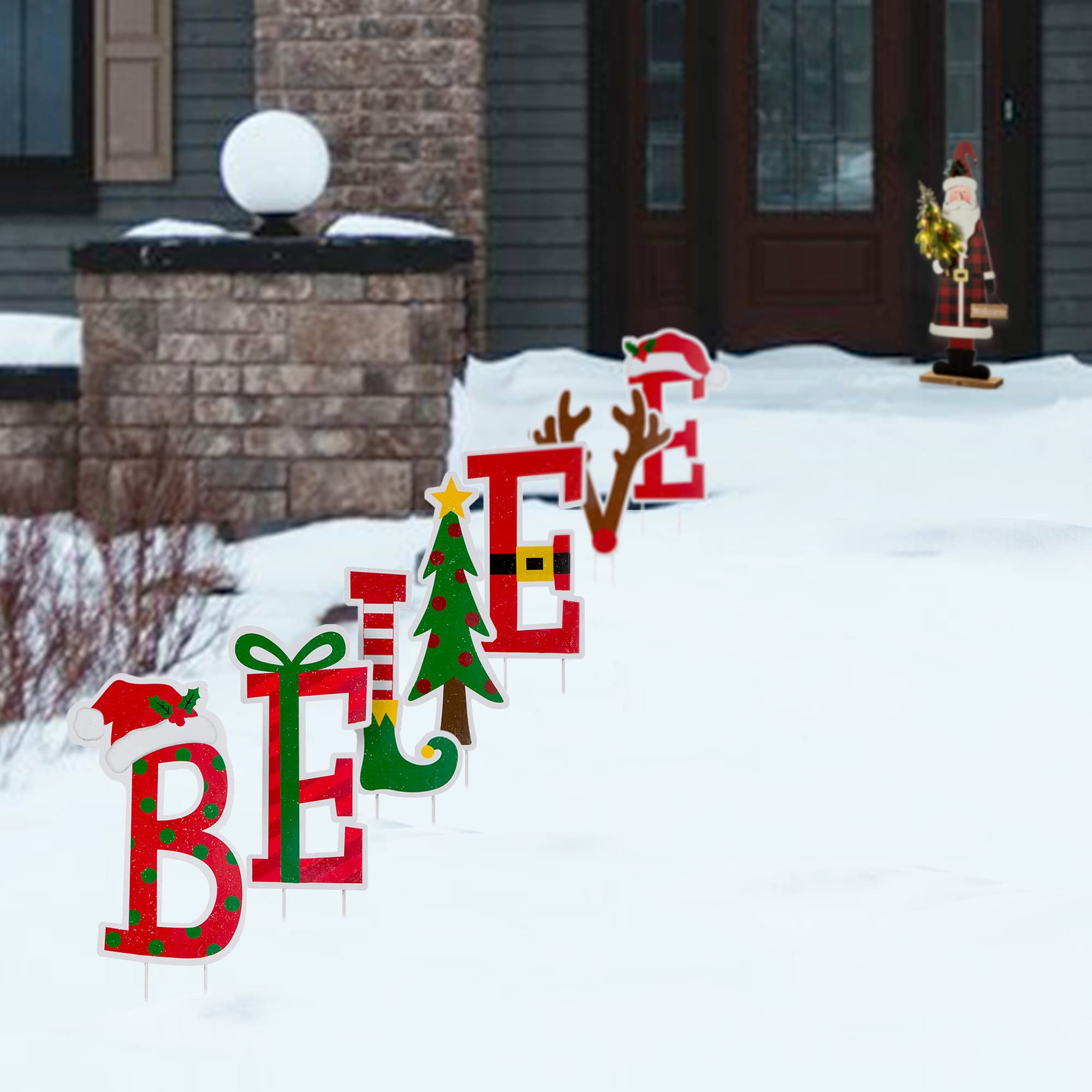 Glitzhome metal stake pushed into lawn showing stable outdoor display benefit