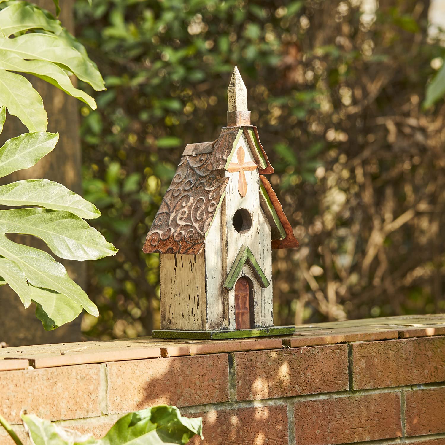 Glitzhome placed in a garden scene providing a charming outdoor focal point
