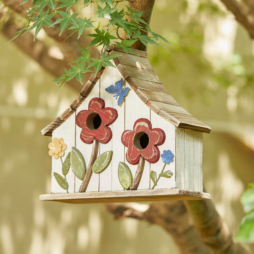 Glitzhome hanging on branch in garden attracting small birds and beautifying space