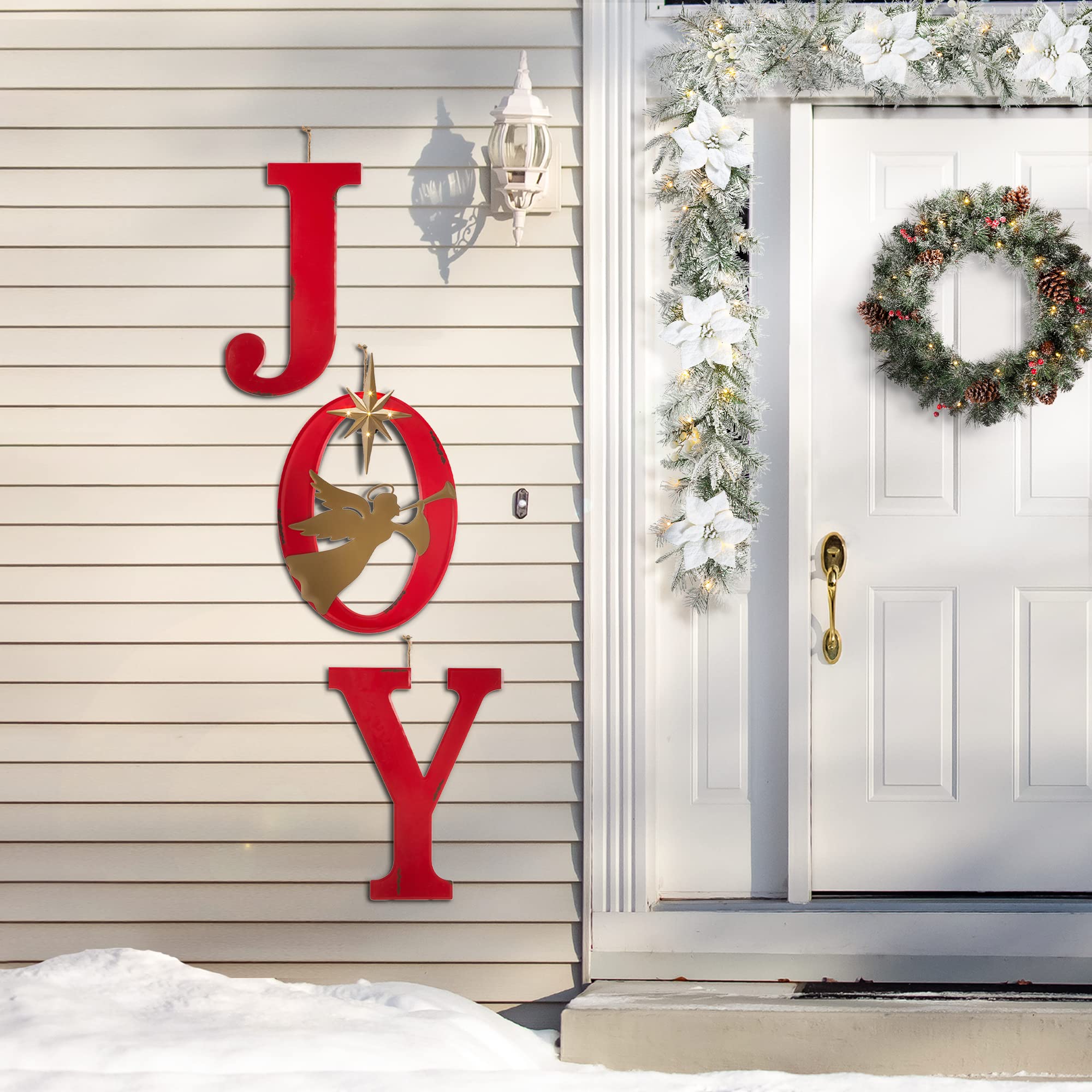 Glitzhome installed in grass at night with lights on creating bright holiday curb appeal