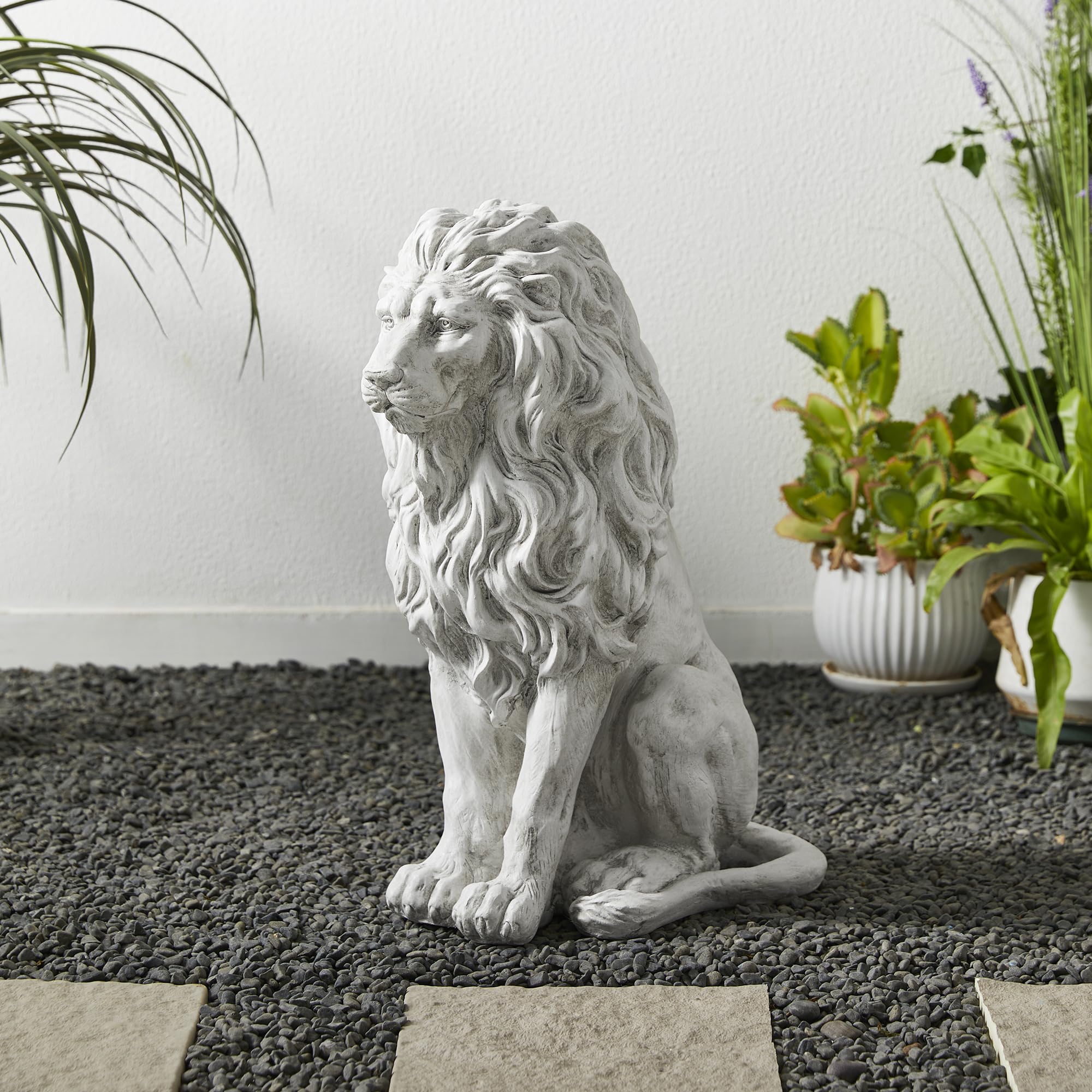 Glitzhome lion beside a chair for scale showing manageable weight