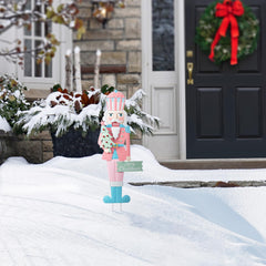Glitzhome nutcracker hung on porch wall showing versatile indoor-outdoor use