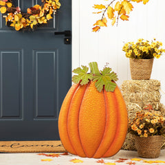 Glitzhome pumpkin stakes inserted into soil showing secure yard placement