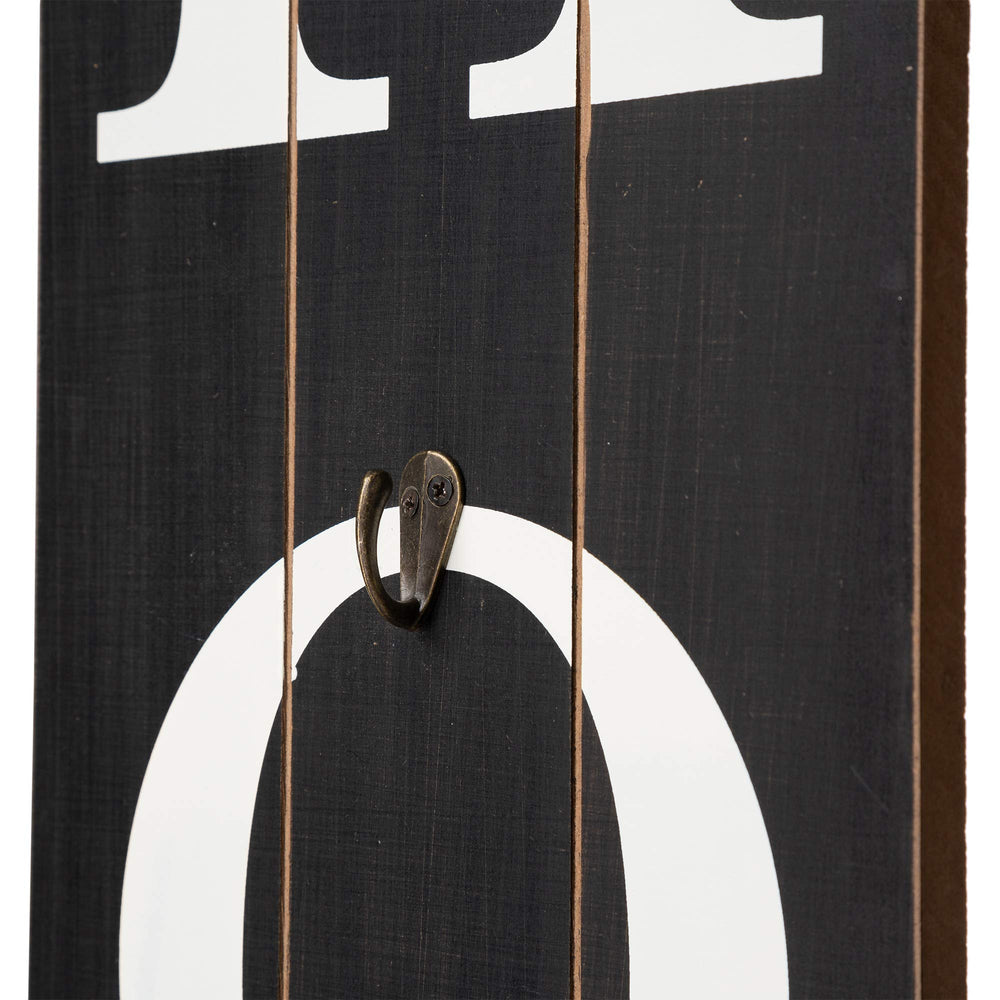 Glitzhome sign beside door and planter to show size and styling benefit