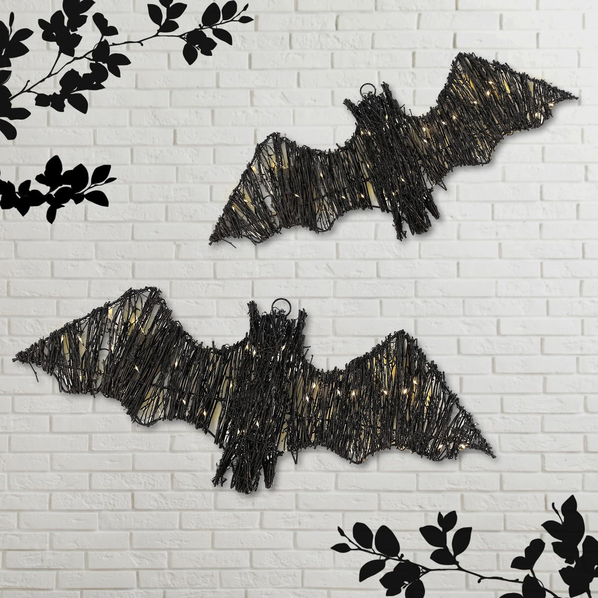 Glooglitter front view of two rattan bats showing silhouette and LED glow