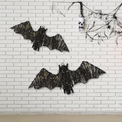 Glooglitter bats lit on a porch at night creating ambient spooky lighting