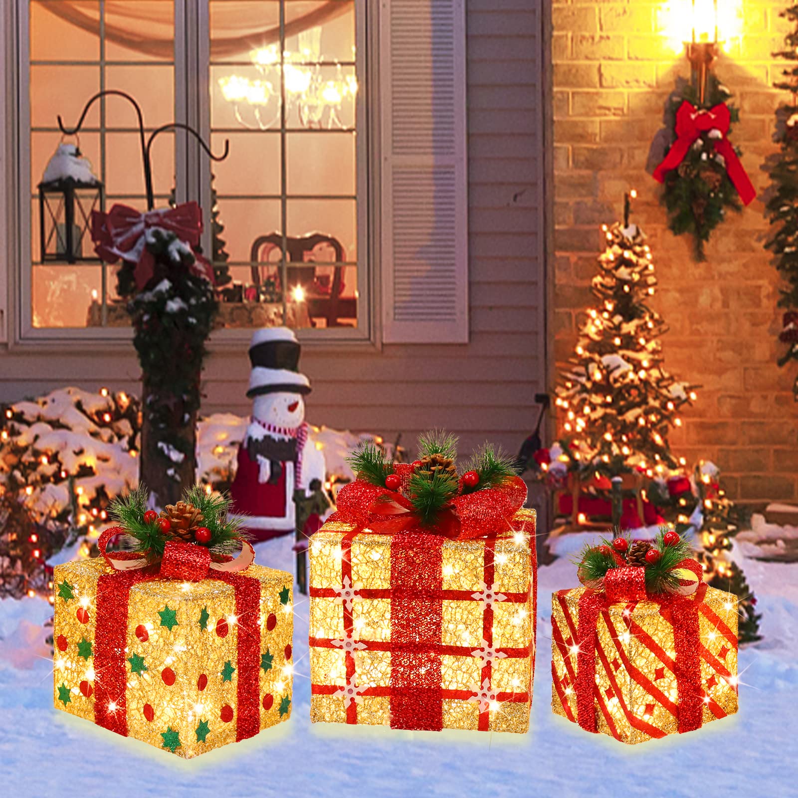 GLOWNOVA trio lit beneath a Christmas tree creating layered glow and festive focal point