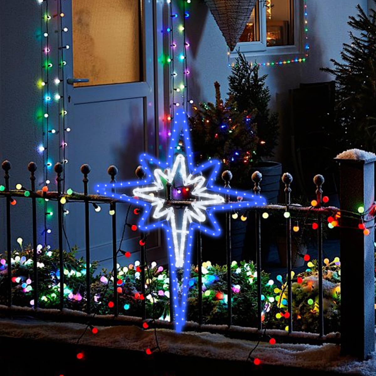 GLOWNOVA star illuminating street at night showing curb appeal and neighborhood visibility benefit