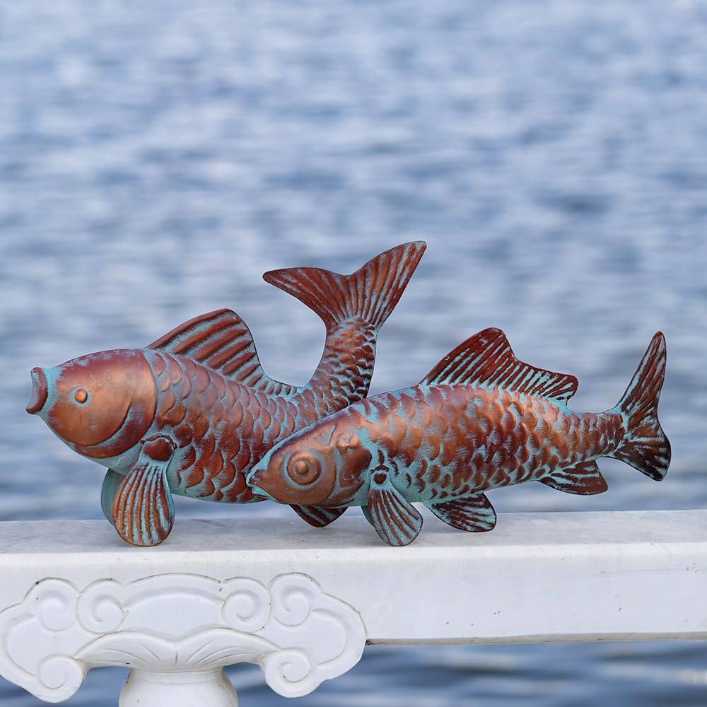 G/N koi statues beside pond creating serene water-feature accent