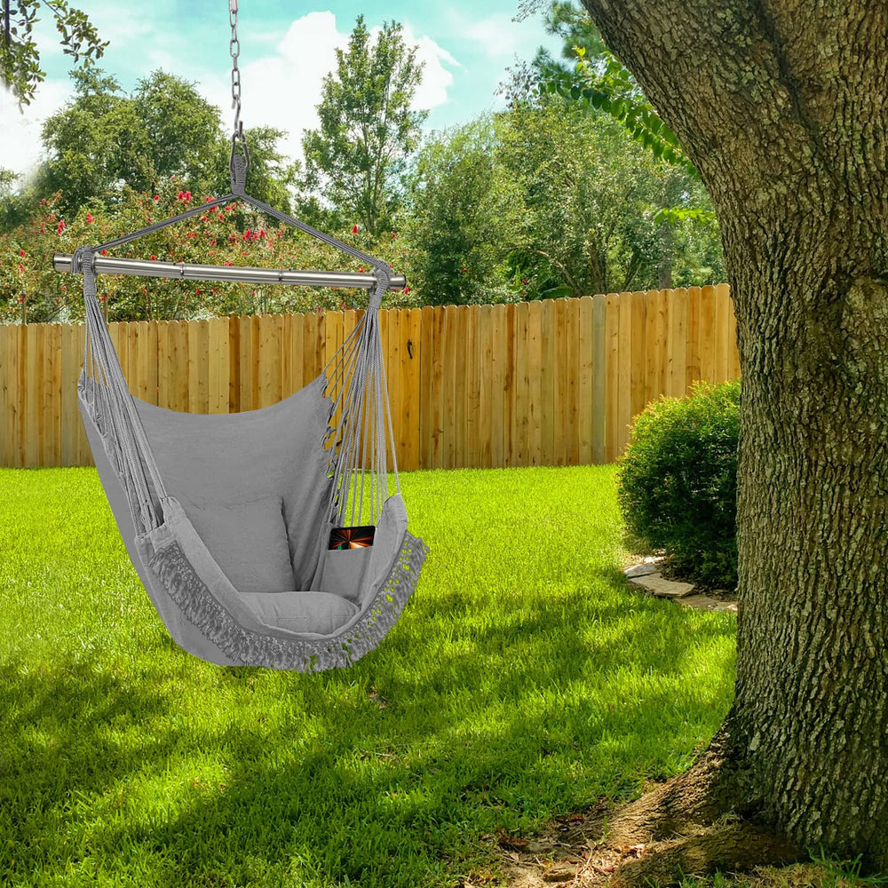 Gold Armour hammock chair hung on patio showing relaxed outdoor lounging benefit
