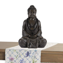 Goodeco Buddha held in hand for scale, lightweight and portable