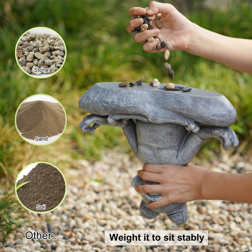 Goodeco frog statue in garden setting adding calm, decorative accent among plants