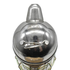 GOODLAND BEE SUPPLY smoker in use by beekeeper producing controlled smoke