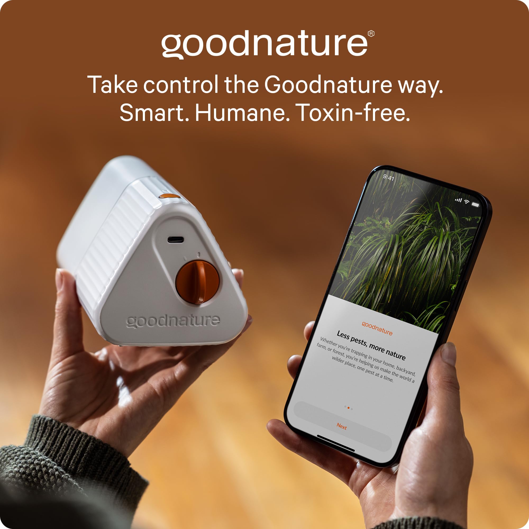 Goodnature trap held in hand for scale, compact design fits small indoor spaces