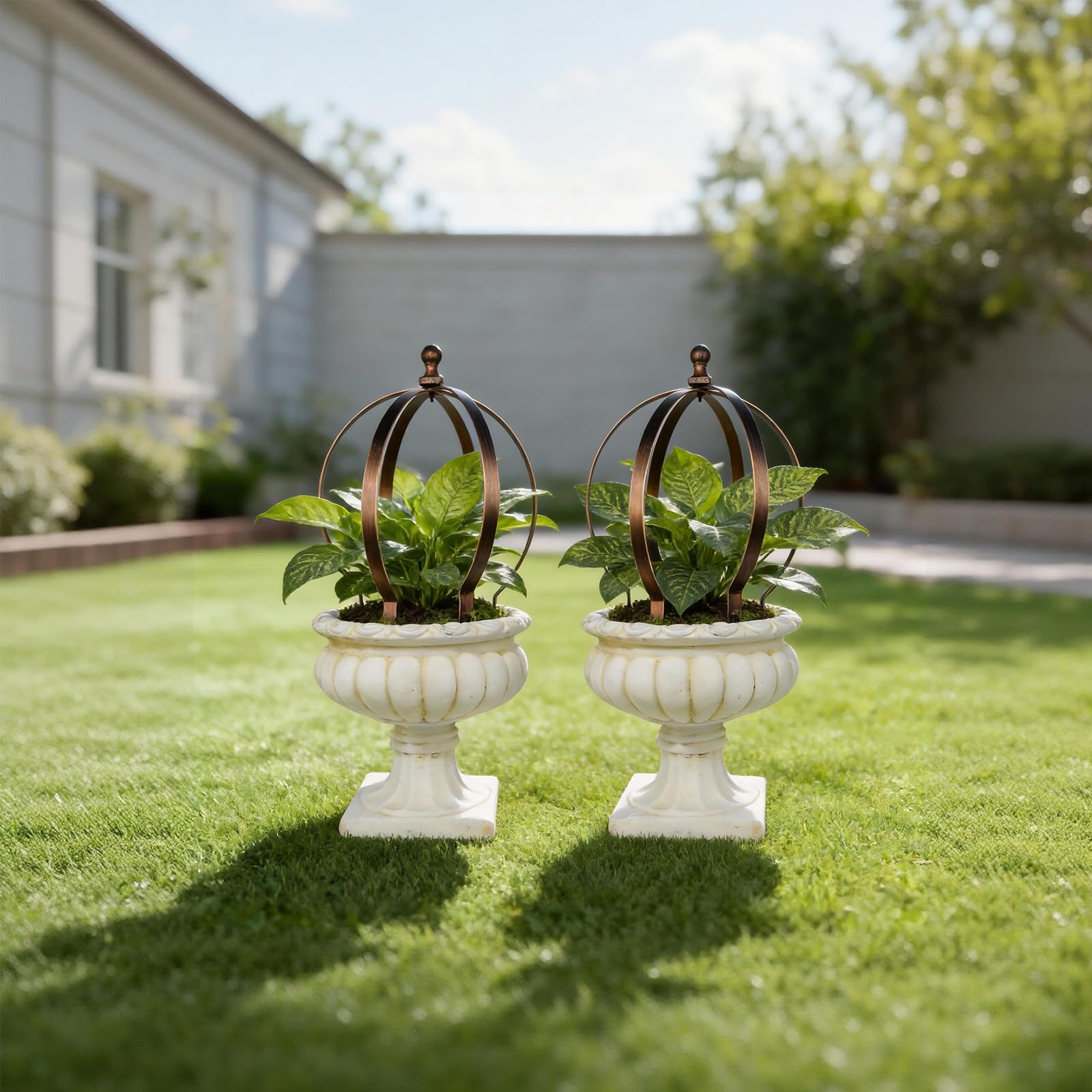 Goooxim pair of obelisks flanking a garden path to create symmetrical entrance appeal