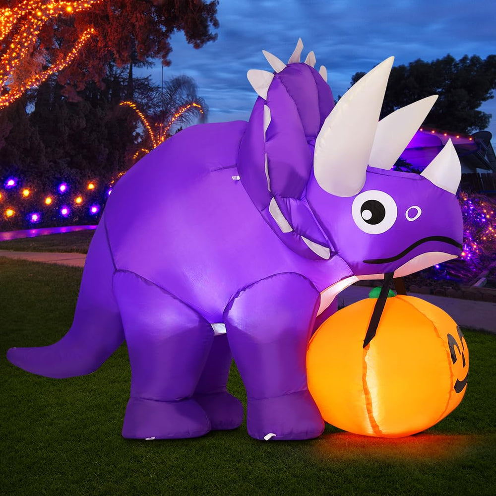 GOOSH dinosaur front view showing pumpkin and spooky charm for yard appeal