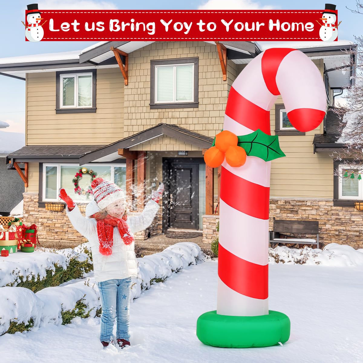 GOOSH inflatable candy cane installed on a lawn adding holiday curb appeal
