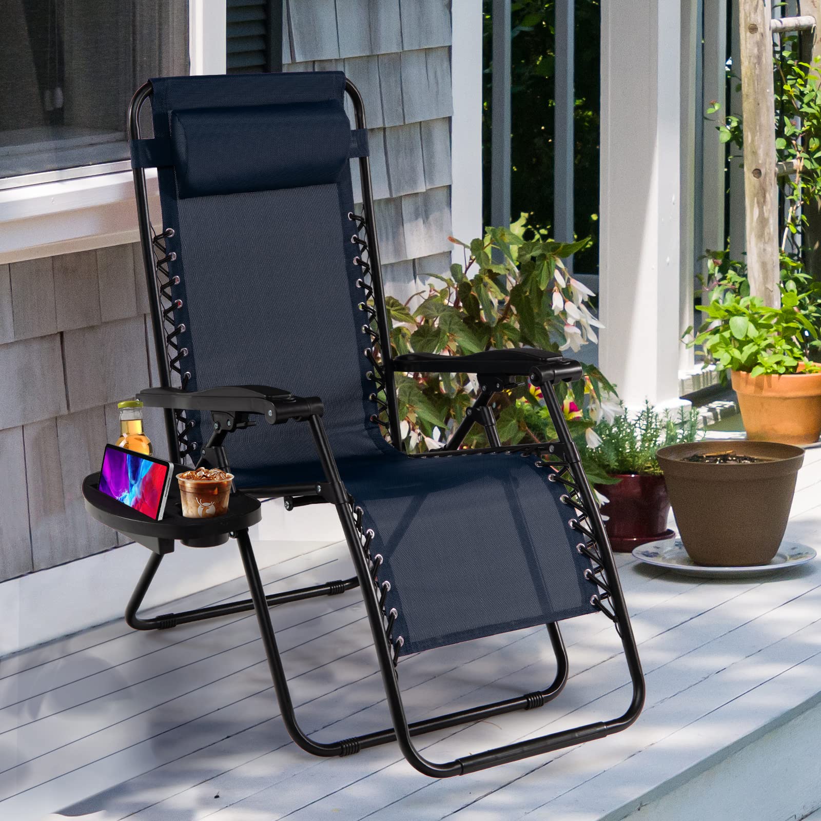 Goplus navy lounge chair in patio scene for outdoor relaxation vibe