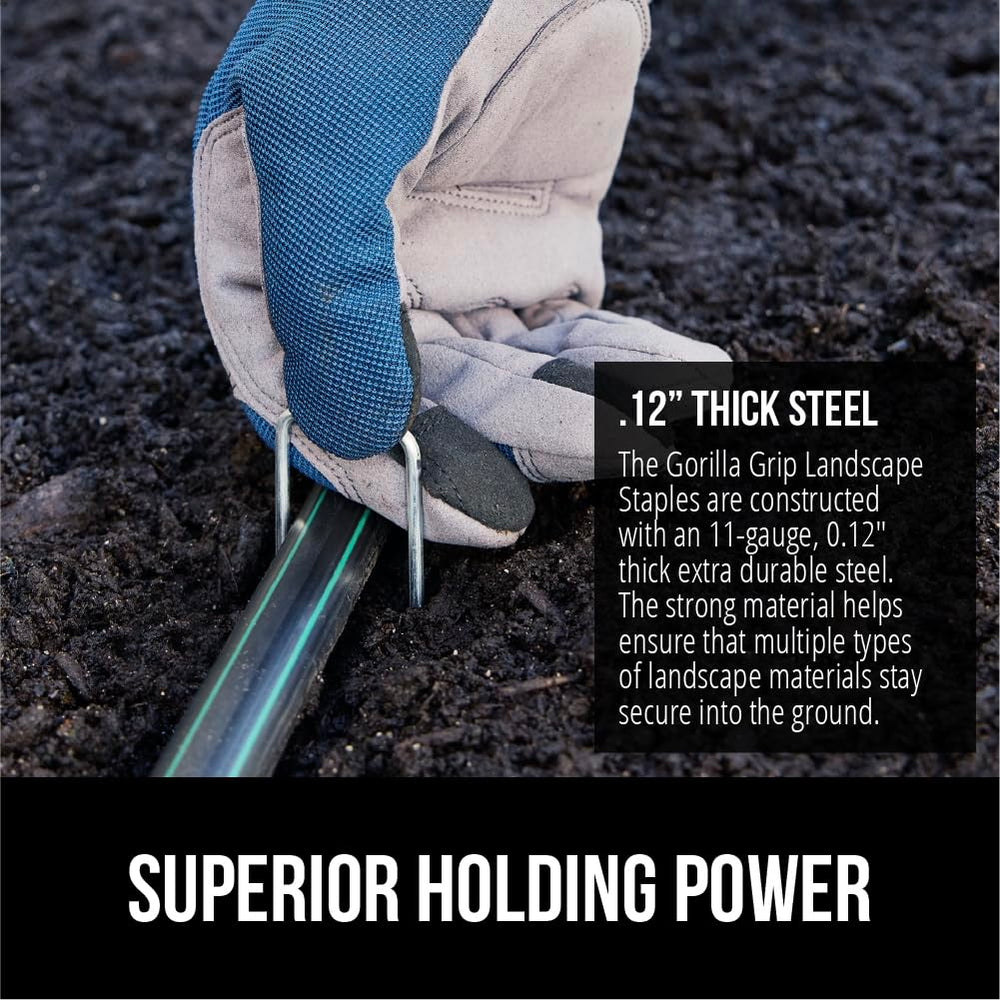 GORILLA GRIP staples inserted in garden soil demonstrating strong hold