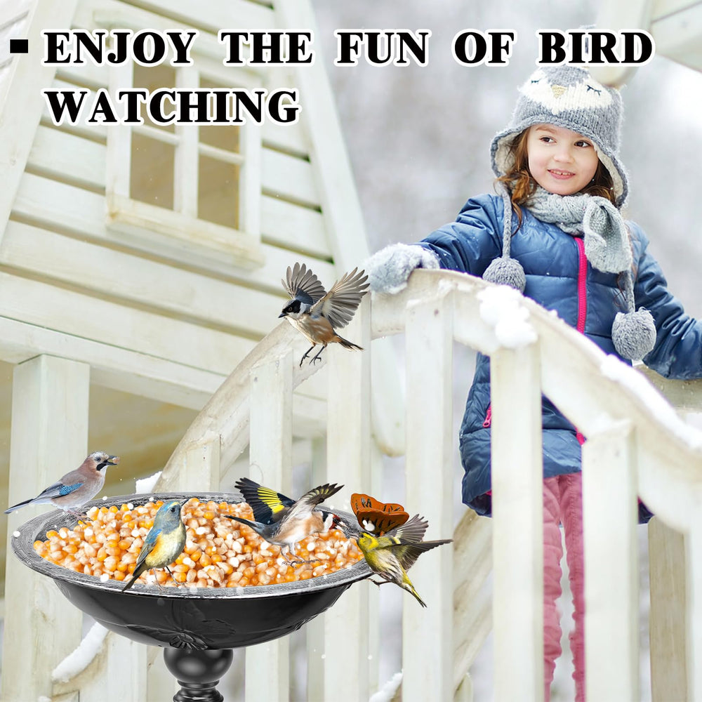 Gouisalin bird bath on patio among plants, adds vintage charm to outdoor space