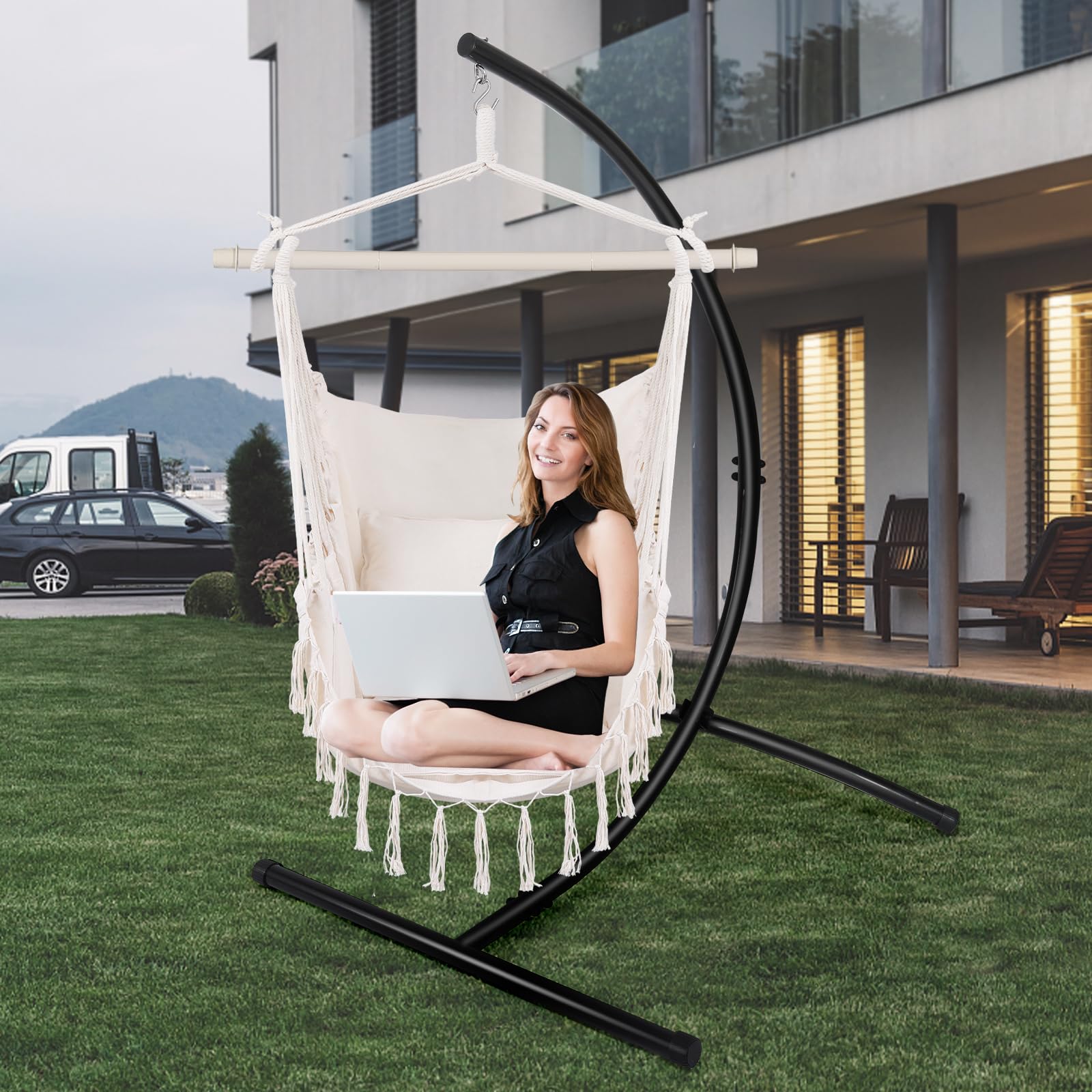 GOUTIME chair next to person for scale showing compact footprint and fit