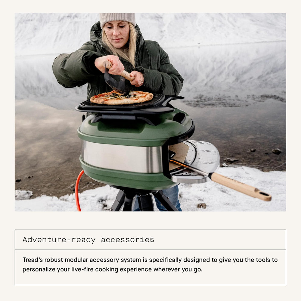 Gozney Tread with a 12-inch pizza inside showing fast cooking and charred edges