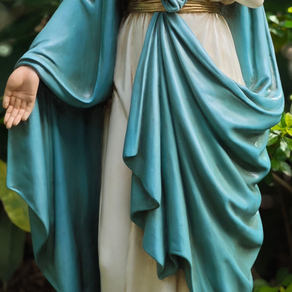 Grace4Joy side profile of saint Mary statue showing pose and balanced composition for gardens