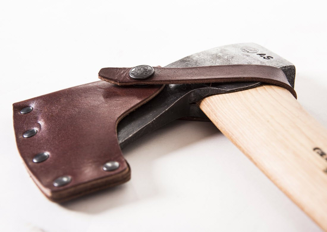 Gränsfors Bruk axe head close-up showing polished bevel and durable steel finish