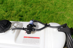 Grass Guardian broadcast boom deployed over turf showing even coverage capability