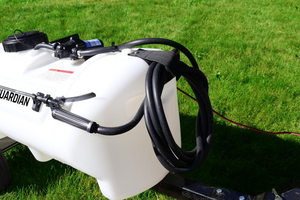 Grass Guardian translucent tank close-up with raised volume markings for accurate mixing